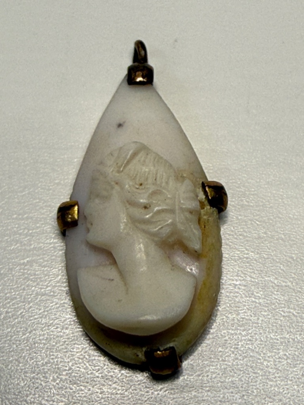 Reserved!!  antique left facing White Cameo Teardrop Pendant charm untested